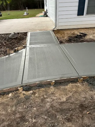 Concrete walkway installation by Leatherwood Lawn Specialists in Houston TX | commercial landscaping, lawn care, lawn maintenance, drainage, concrete, outdoor solutions near Houston TX Concrete walkway installation by Leatherwood Lawn Specialists in Houston TX